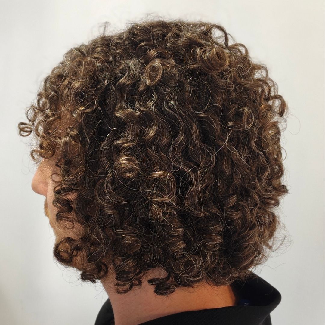 Natural hair bob with defined brown curls styled at True Hair Collective Sydney CBD